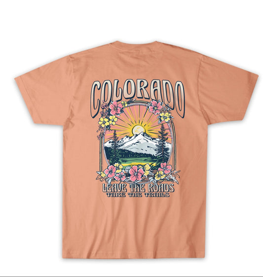 Peach-colored t-shirt with Colorado-themed graphic design on a peach background