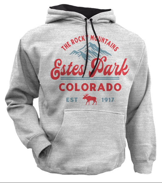 A light heather gray hoodie shown on a white background with a large printed graphic on the chest reading 'The Rocky Mountains Estes Park Colorado Est 1917' in red and blue, plus a moose illustration. Text above the hoodie identifies the product as a luxury mountain moose hoodie in ash with iron.