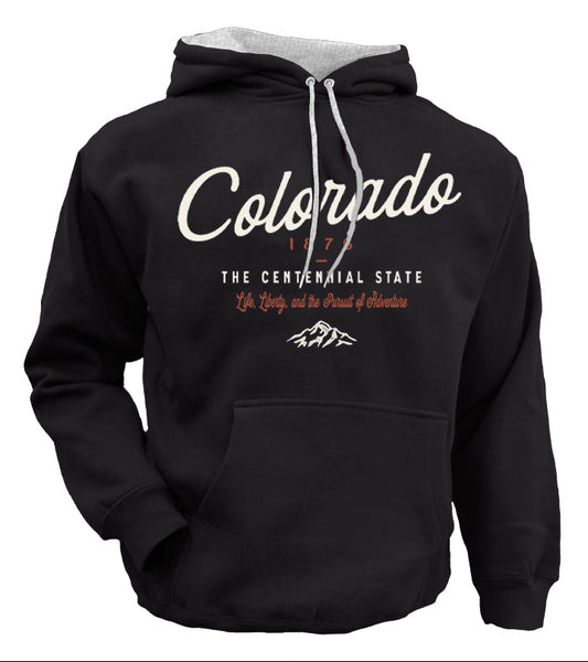 A black pullover hoodie with a white and red graphic print reading 'Colorado 1876 The Centennial State' and a small mountain logo, shown below a matching graphic panel on a dark background.